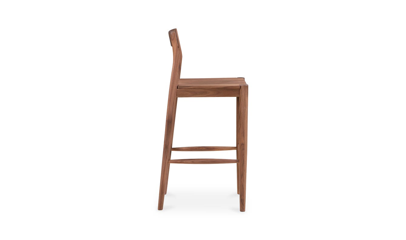 lifestyle view of Owing Barstool Walnut luxury Chair