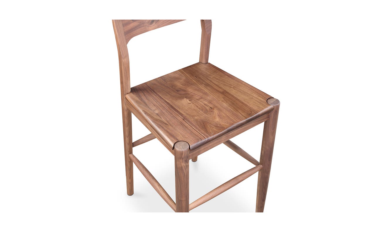 lifestyle view of Owing Barstool Walnut luxury Chair