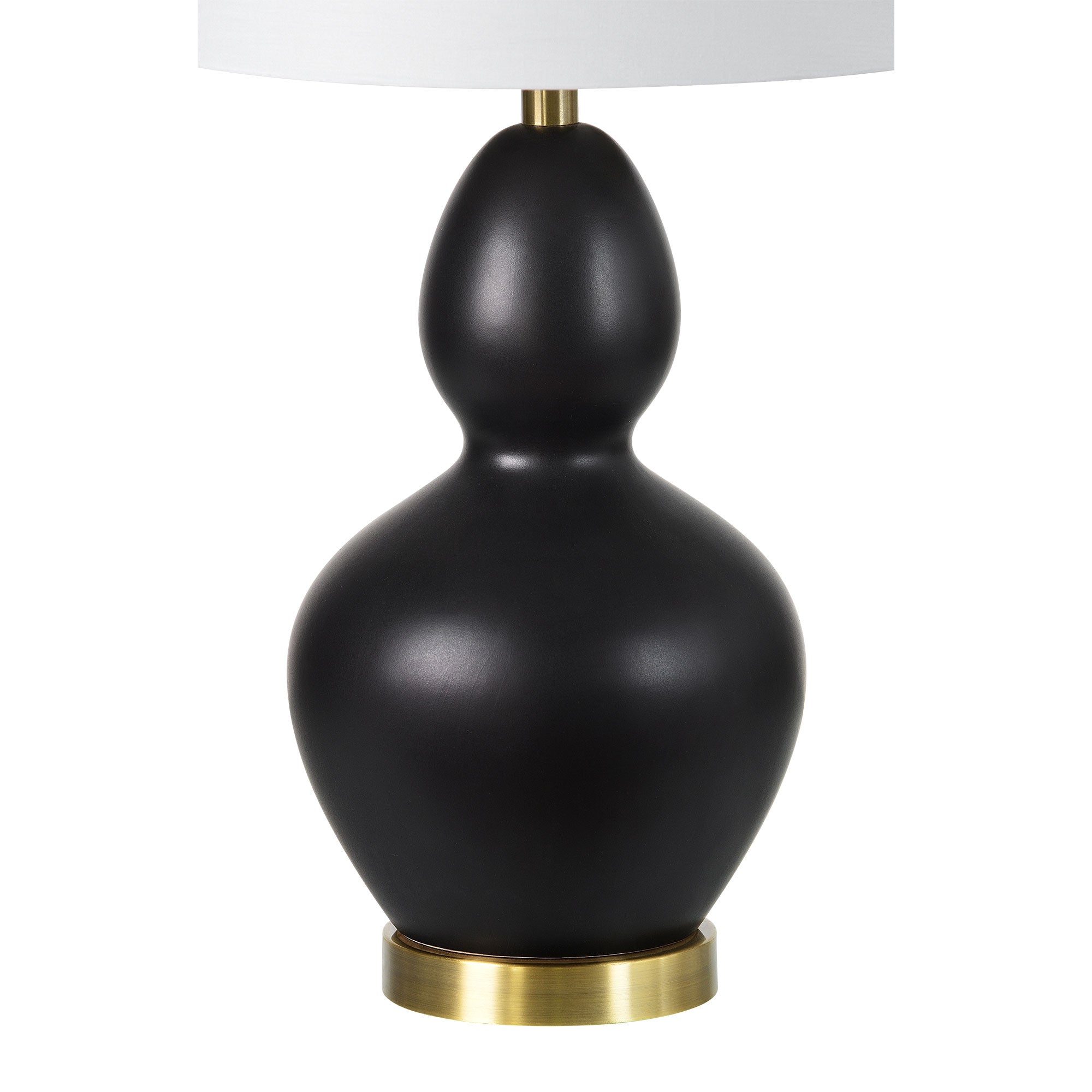 Kamilia Table Lamp showcasing a single black ceramic lamp with a white shade and brass base.