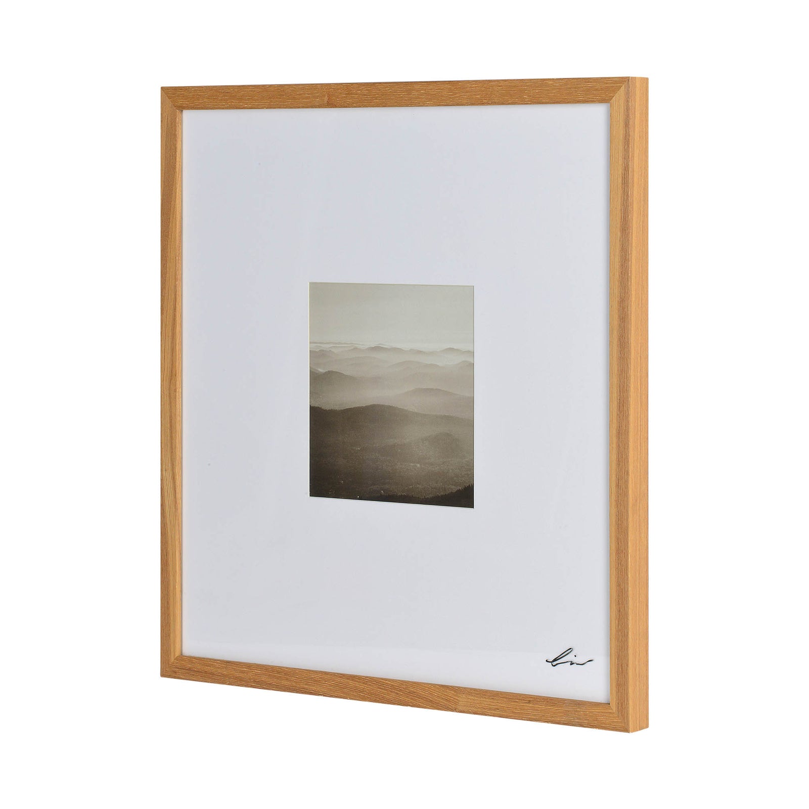 Torreys Wall Art featuring four framed black and white landscape images with wooden frames.