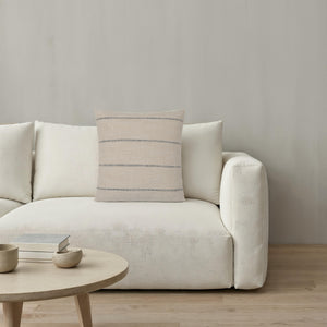 Montana indoor pillow on a white sofa with a minimalist decor