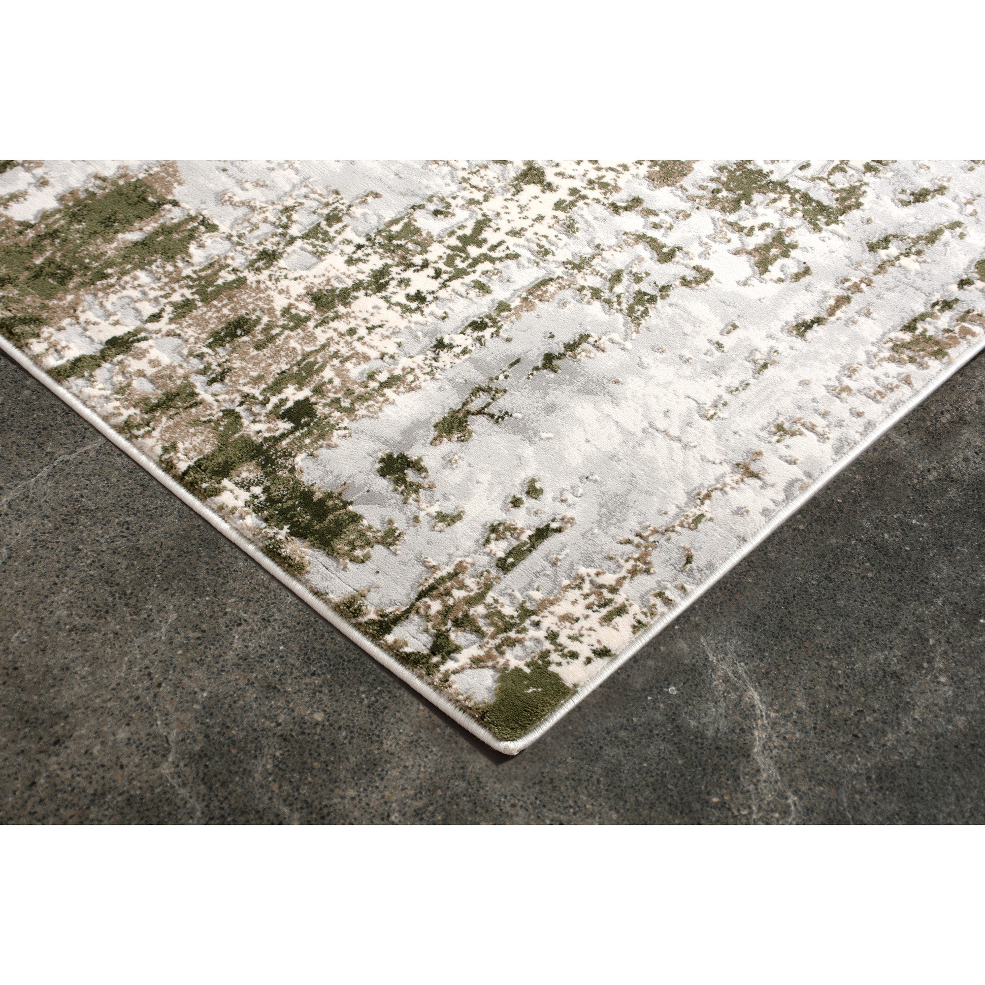 Close-up view of the Ariella Indoor Rug's edge, highlighting its soft texture and color blend.