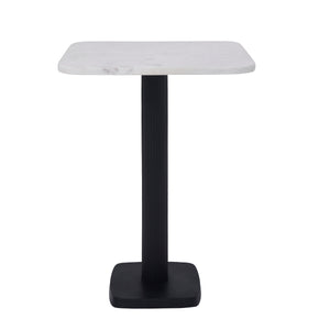 Laila Side Table with a square white marble top and black ribbed pedestal base.