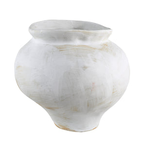 Elia vase featuring a white ceramic finish with subtle beige accents and a curvy silhouette.