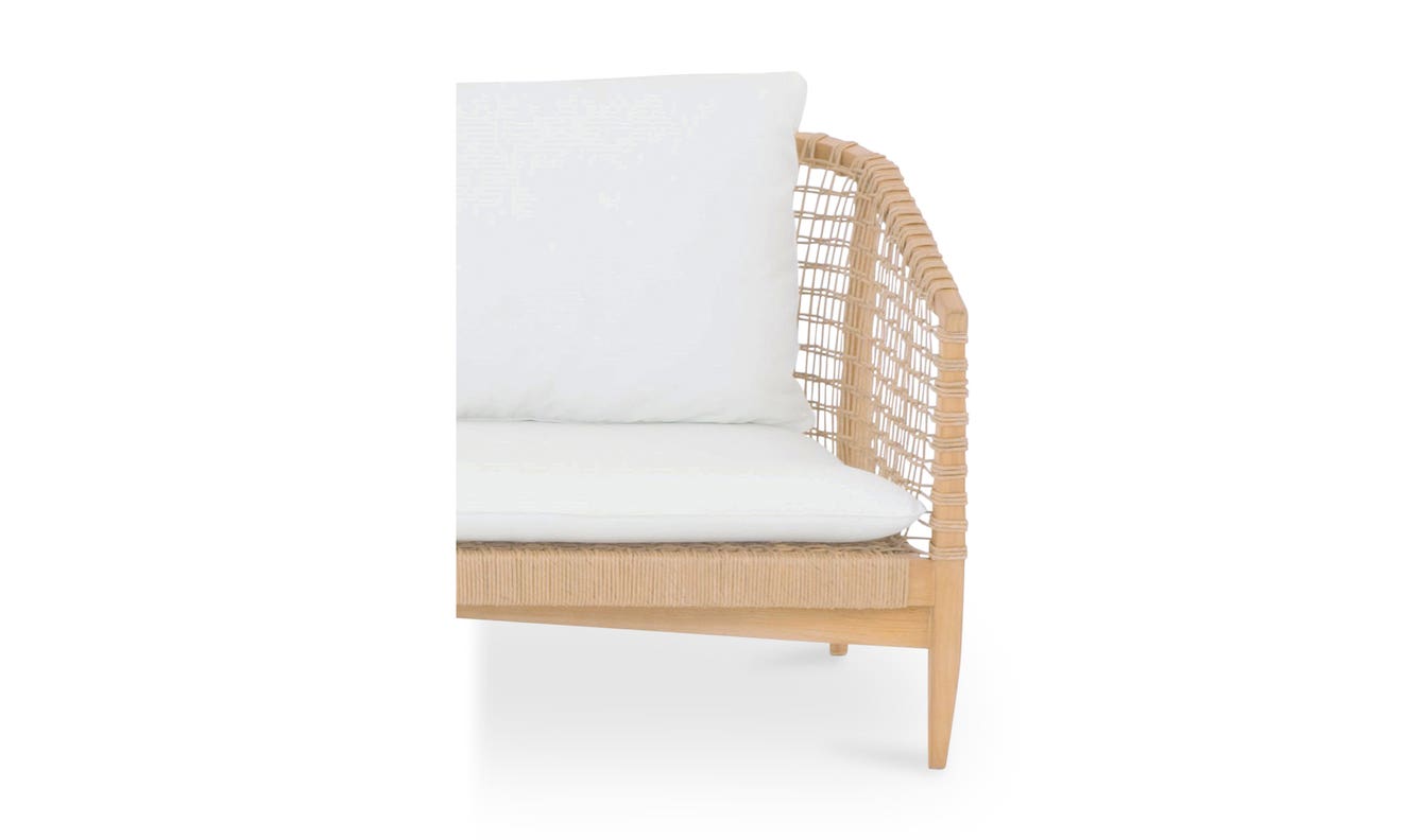 lifestyle view of Kuna Outdoor Sofa White luxury Chair