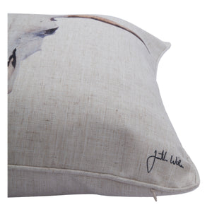 Elgin pillow with a close-up view of the bull skull design and signature detail.