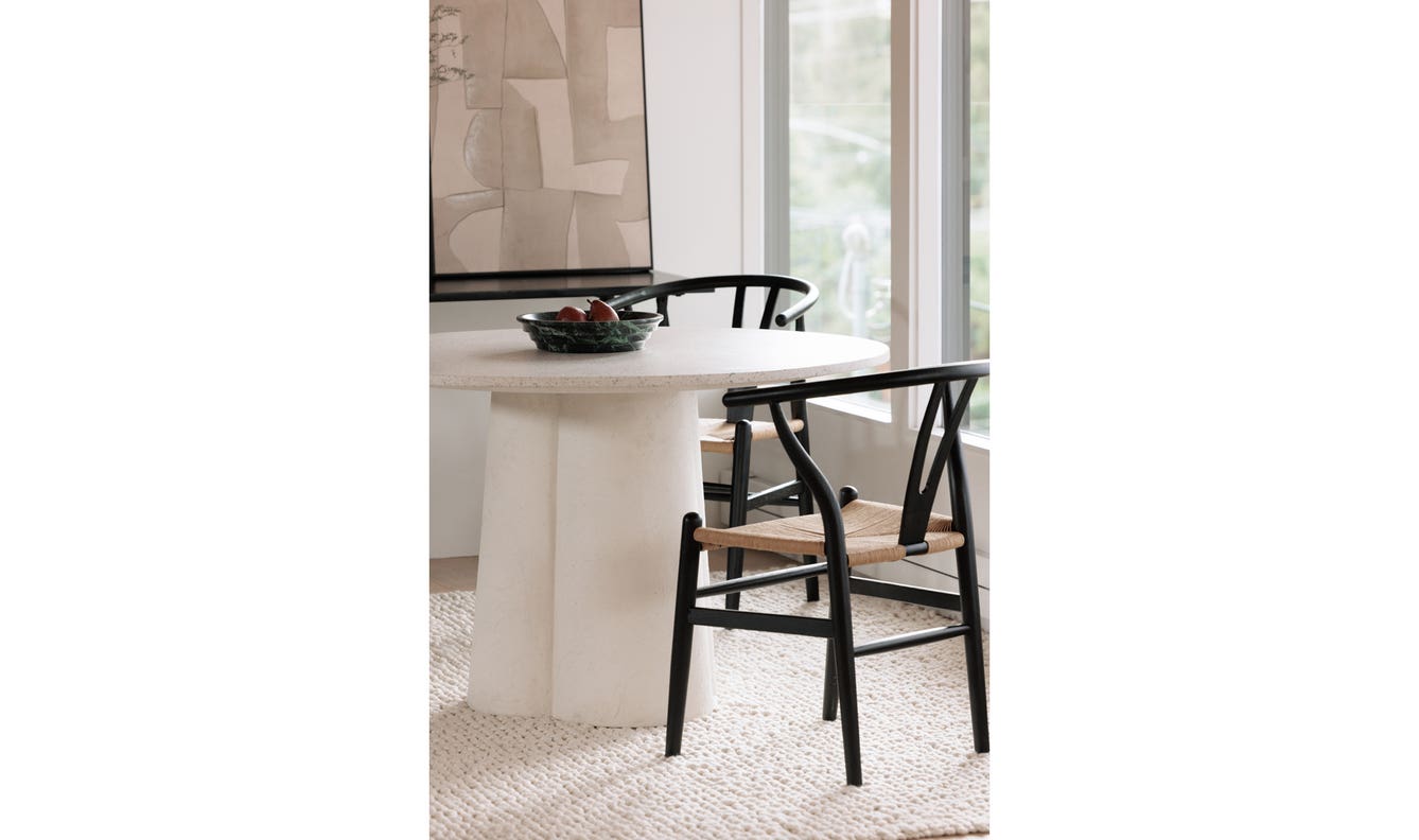 lifestyle view of Ventana Dining Chair Black And Natural - Set Of Two luxury Chair