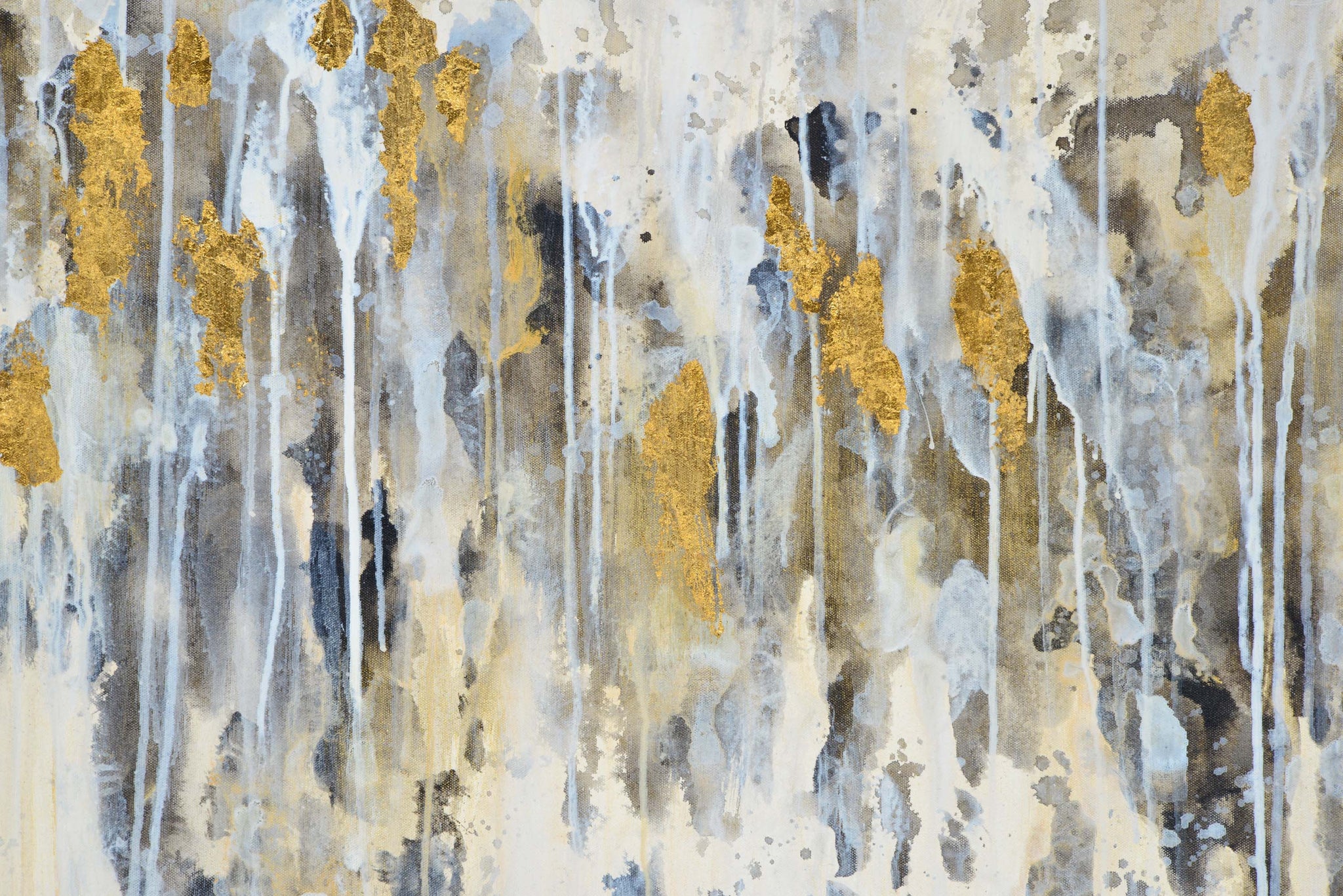 Close-up of Kobi canvas art showcasing gold leaf details against a textured gray and white backdrop