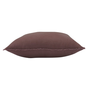 Side view of Pan Indoor Pillow in brown, featuring frayed edges and soft fabric.