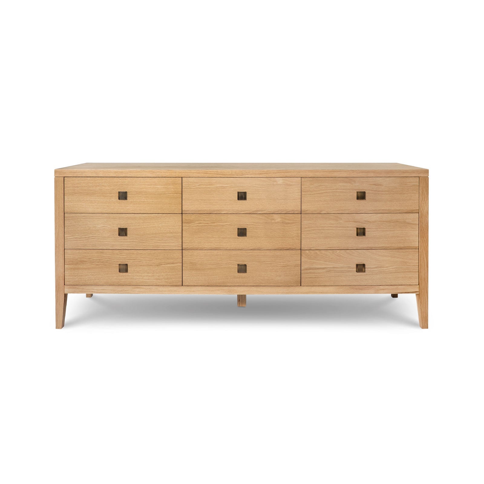 Wooden dresser with multiple drawers on a white background