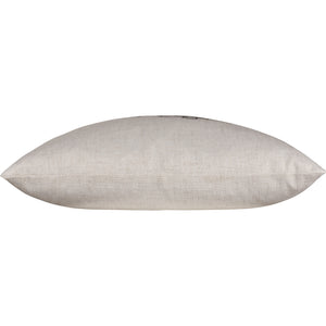 Side view of Knot Indoor Pillow displaying a smooth beige fabric finish