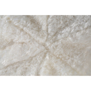 Top view of Freddie Indoor Pillow, highlighting the soft cream texture and seam details.