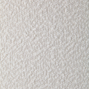 Close-up of Audrina Ottoman's textured white fabric, showcasing intricate details