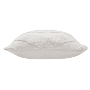 Side view of Chiara Indoor Pillow displaying its plush profile