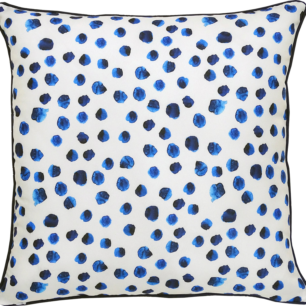 Lustra Outdoor Pillow featuring a white background with blue watercolor polka dots and a black trim.