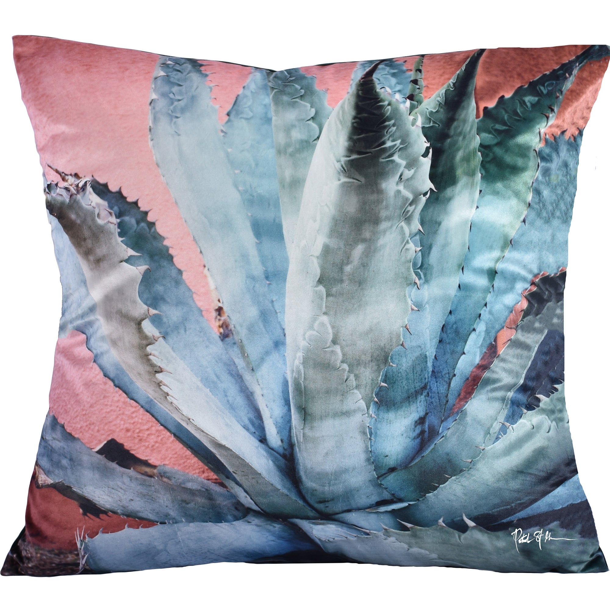 Jinson pillow featuring a vibrant agave plant design in shades of green and blue against a pink background.