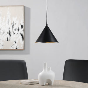 Cinder Ceiling Fixture in black above a dining table, paired with white vase and artwork on wall.