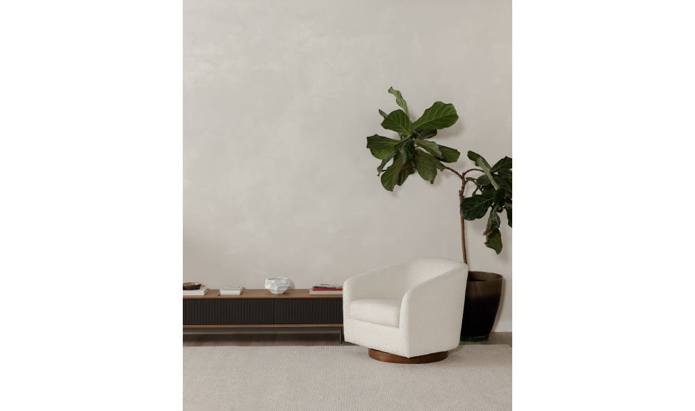 side view of Oscy Swivel Chair Shearling White luxury Chair