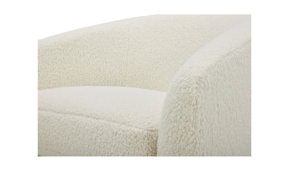 lifestyle view of Oscy Swivel Chair Shearling White luxury Chair