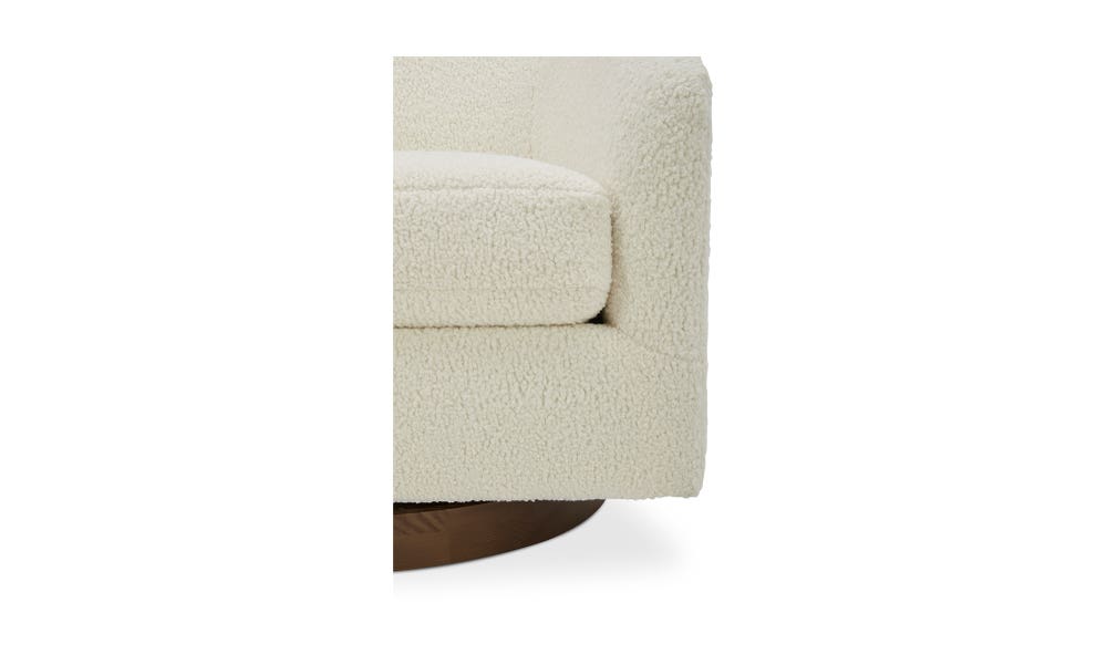 lifestyle view of Oscy Swivel Chair Shearling White luxury Chair