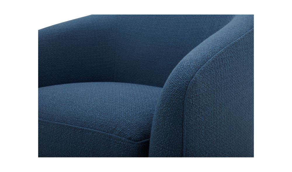 lifestyle view of Oscy Swivel Chair Dark Atlantic luxury Chair