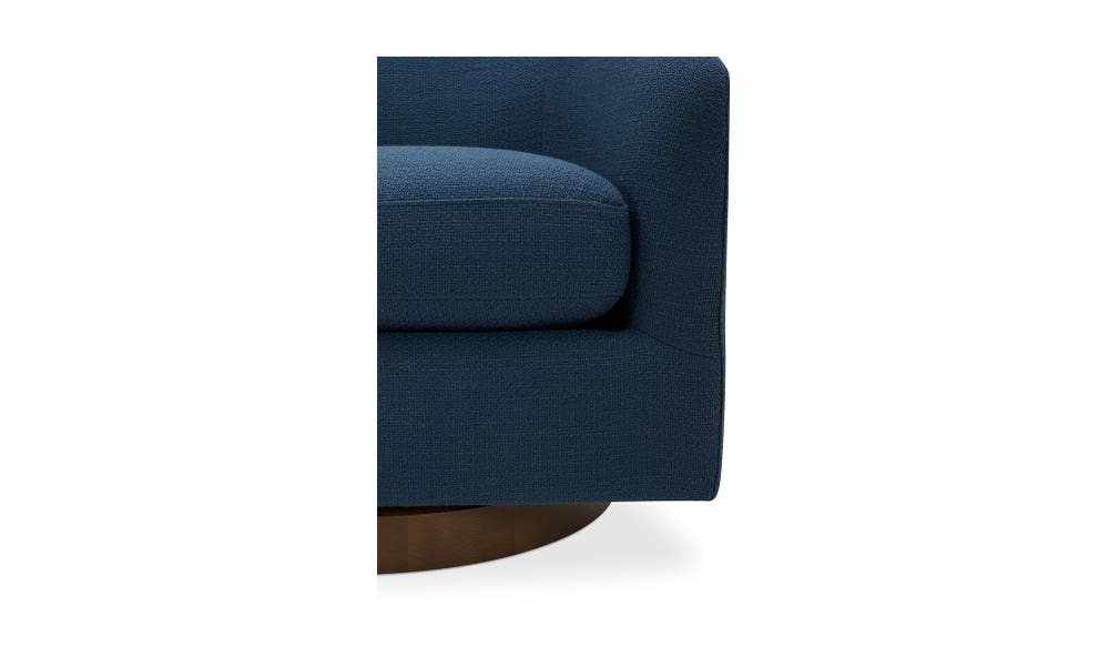 lifestyle view of Oscy Swivel Chair Dark Atlantic luxury Chair