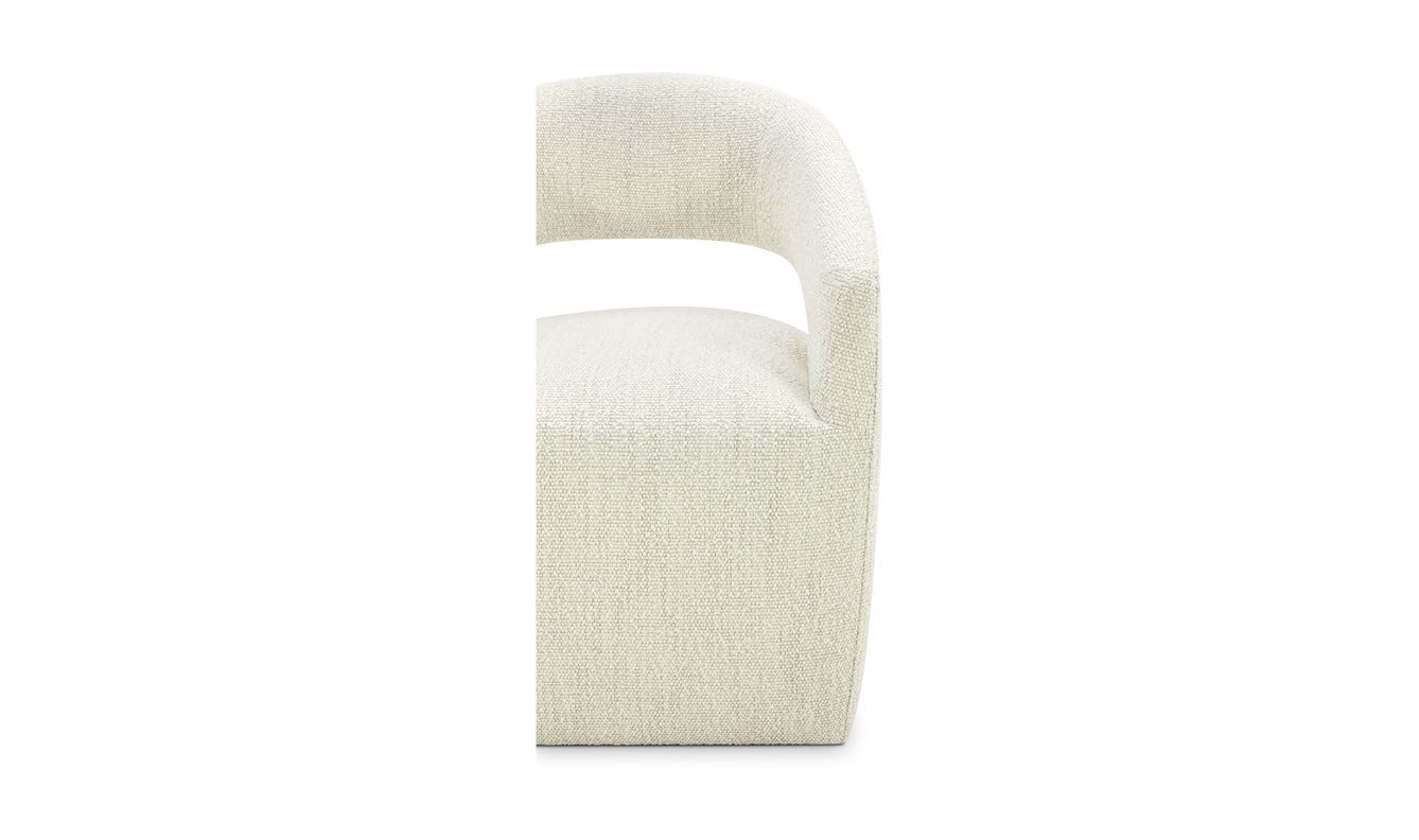 lifestyle view of Barrow Rolling Dining Chair White Mist luxury Chair
