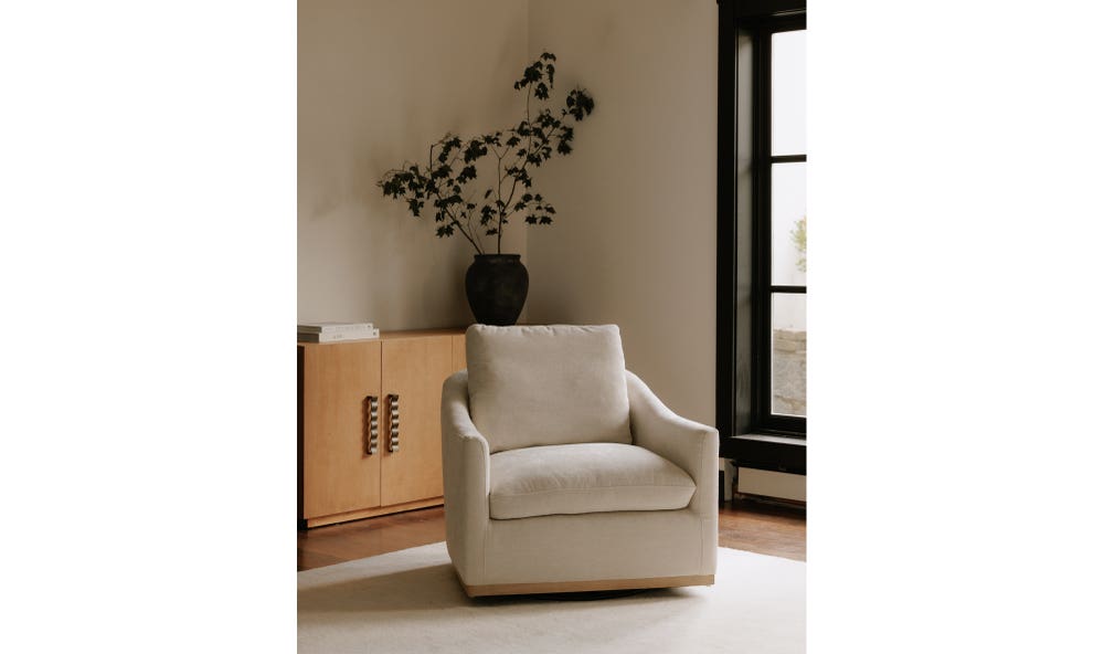 angle view of Linden Swivel Chair Beige luxury Chair