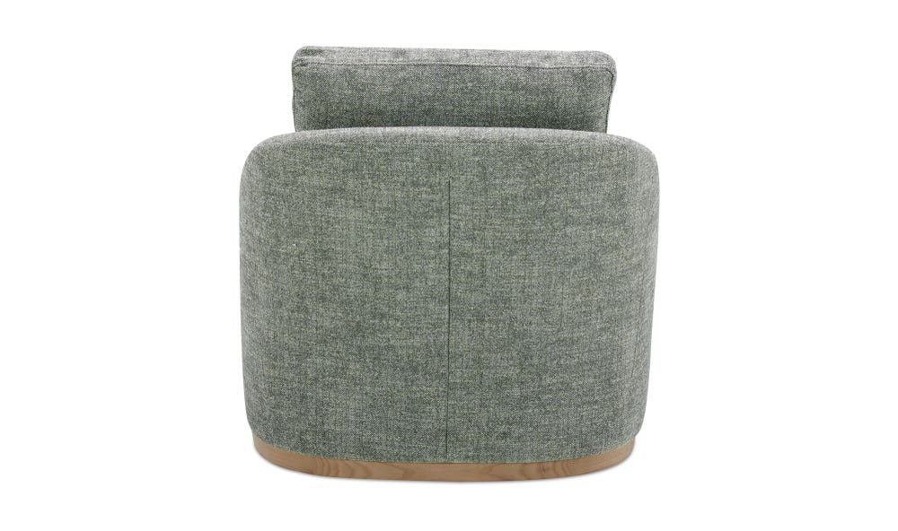 lifestyle view of Linden Swivel Chair Slated Moss luxury Chair