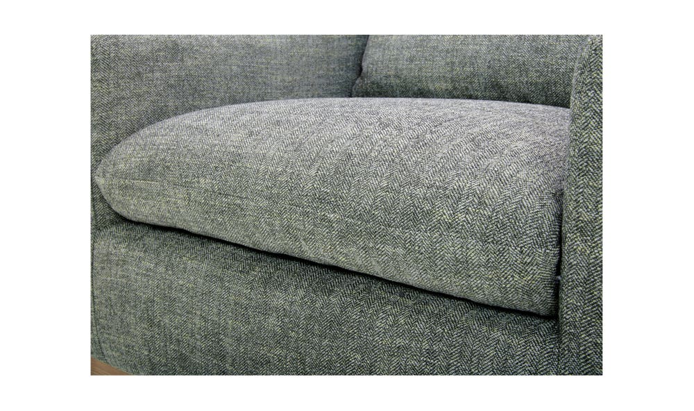 lifestyle view of Linden Swivel Chair Slated Moss luxury Chair