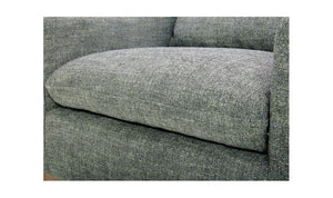 lifestyle view of Linden Swivel Chair Slated Moss luxury Chair