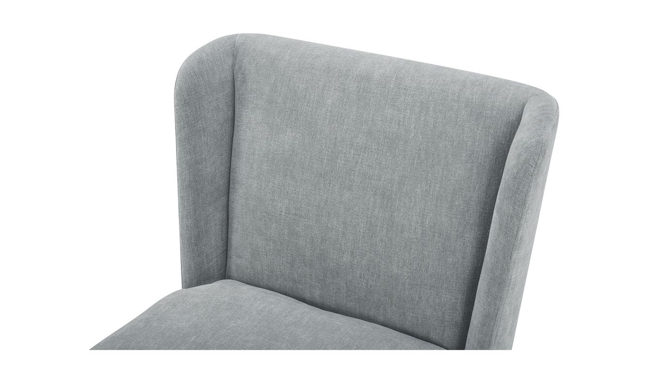 lifestyle view of Cormac Rolling Dining Chair Performance Fabric Slate Green luxury Chair