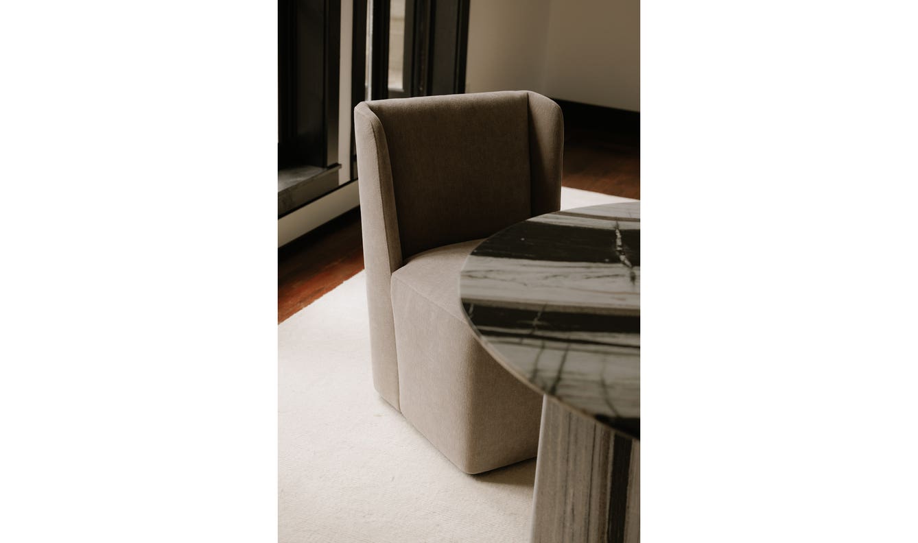 side view of Cormac Rolling Dining Chair Performance Fabric Warm Sand luxury Chair