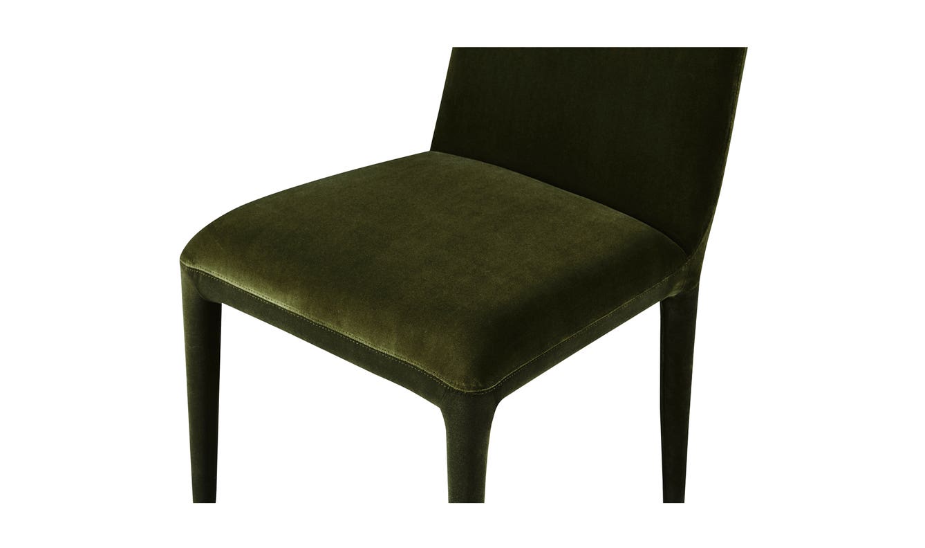 lifestyle view of Calla Dining Chair Set Of Two Green Velvet luxury Chair