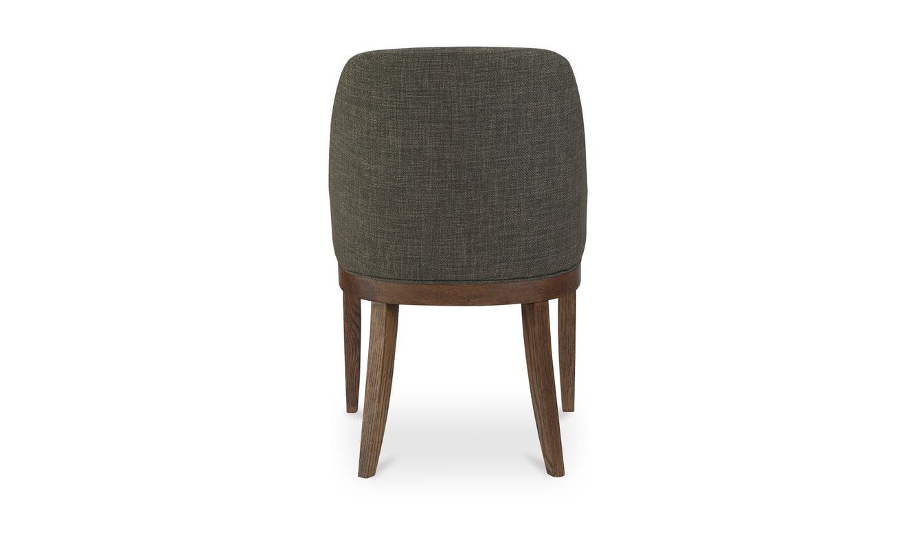 lifestyle view of Edward Dining Chair Heather Green luxury Chair