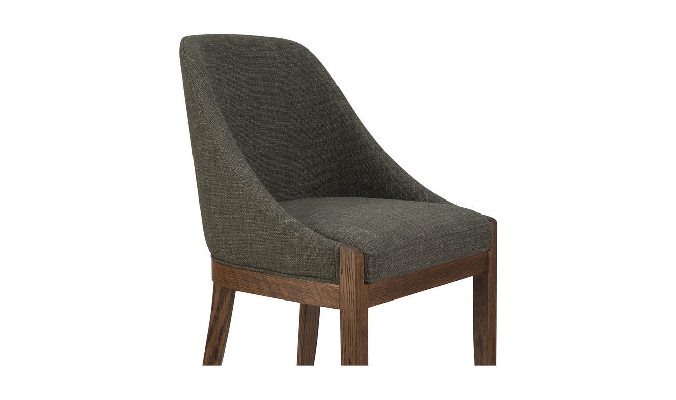 lifestyle view of Edward Dining Chair Heather Green luxury Chair
