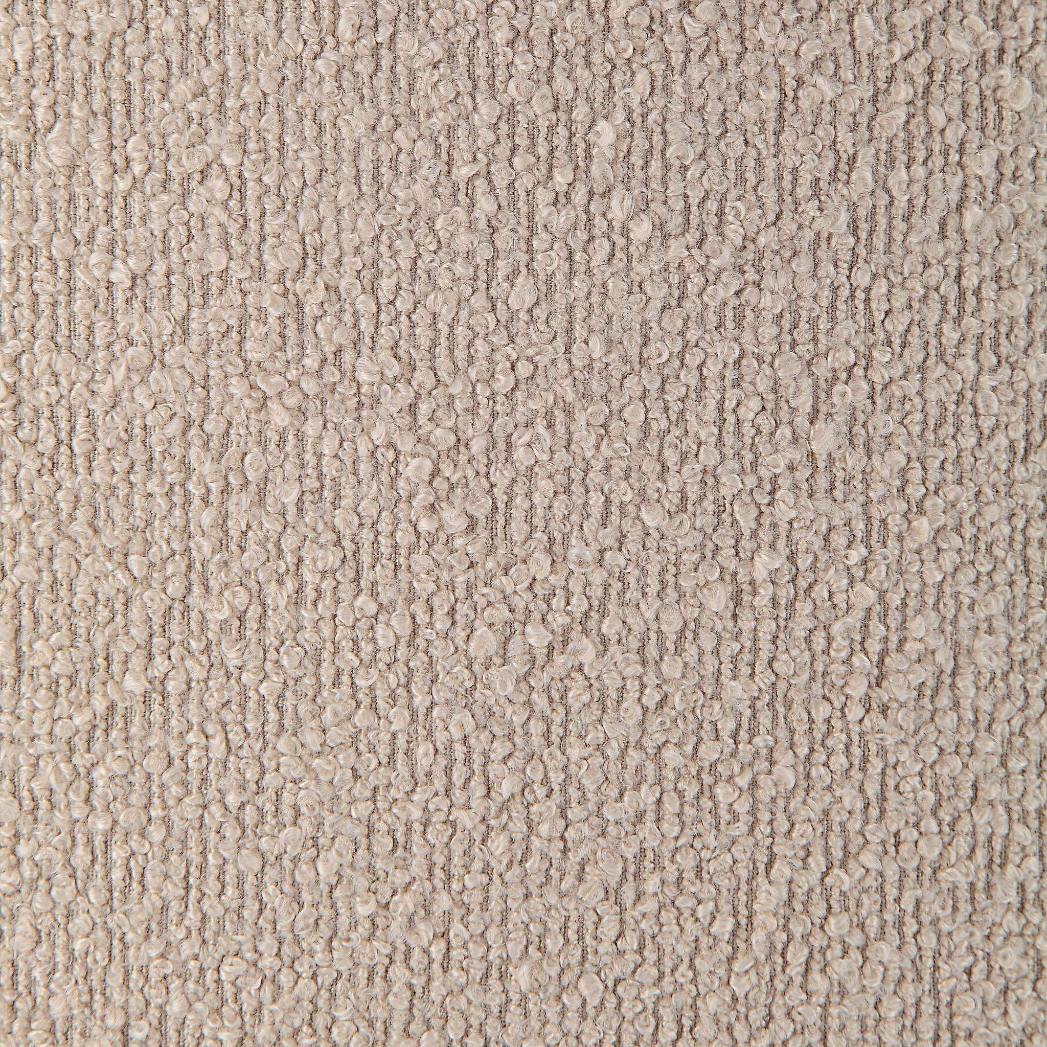 Close-up of Claude Ottoman's textured beige fabric surface
