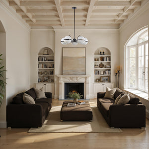 Roca ceiling fixture in a living room setting, featuring five white marble globes above a cozy seating area.