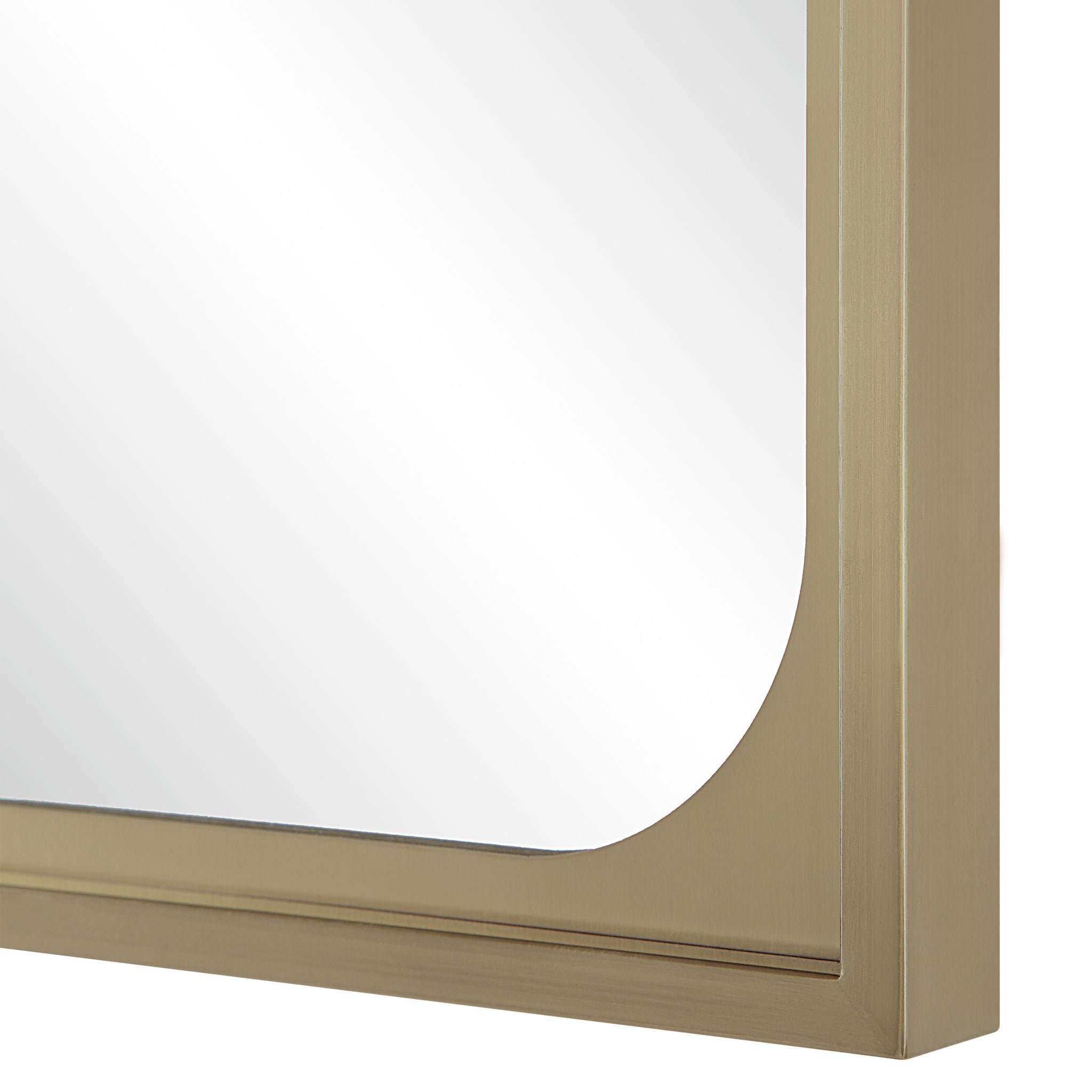 Close-up of Sati Wall Mirror's gold frame highlighting the rounded corners and reflective glass.