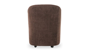 lifestyle view of Drava Rolling Dining Chair luxury Chair