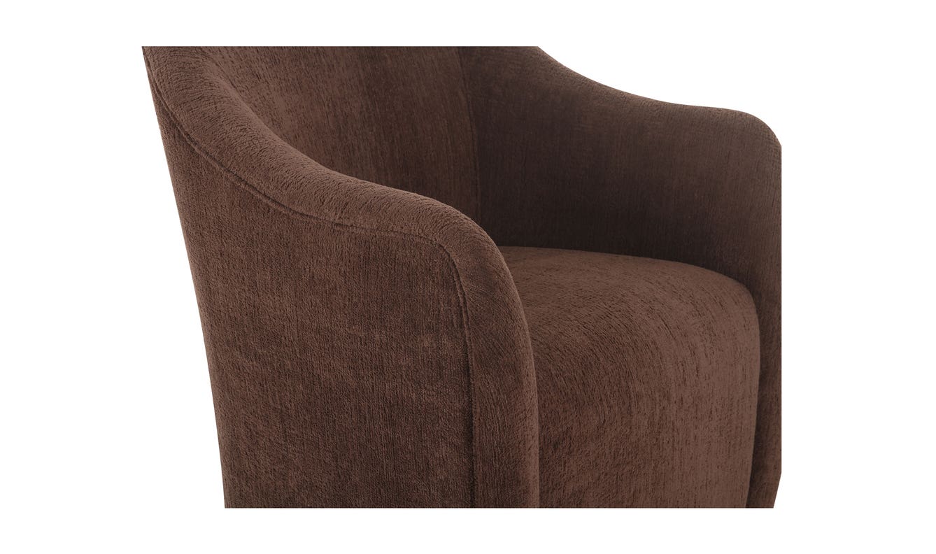 lifestyle view of Drava Rolling Dining Chair luxury Chair