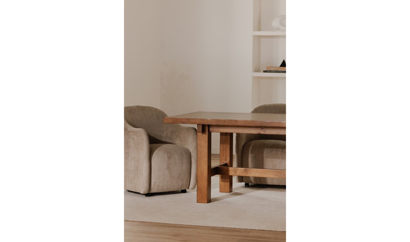 lifestyle view of Drava Rolling Dining Chair luxury Chair