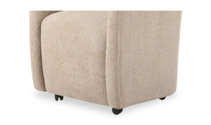 lifestyle view of Drava Rolling Dining Chair luxury Chair