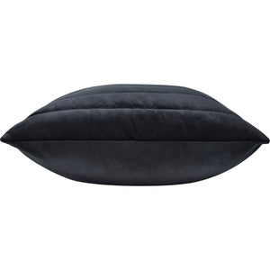 Side view of Chatra Indoor Pillow in dark gray highlighting its plush design