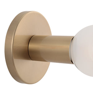 Dania Wall Sconce close-up showing brushed gold base and white glass bulb.