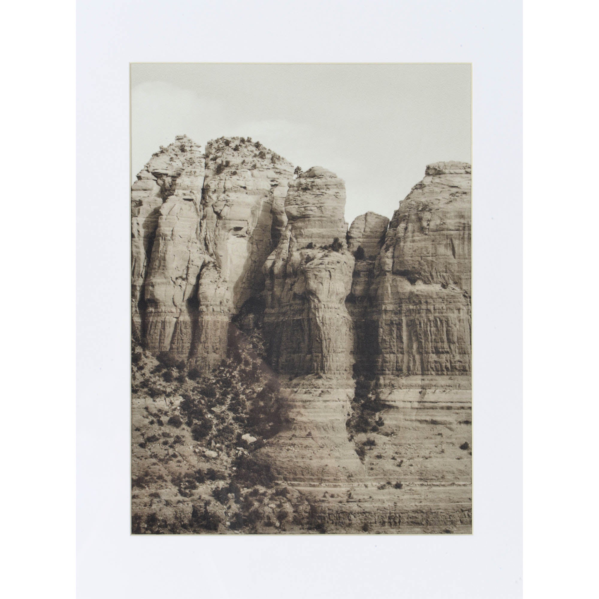 Torreys Wall Art depicting a sepia-toned mountain landscape in a white frame