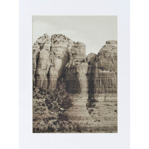 Torreys Wall Art depicting a sepia-toned mountain landscape in a white frame