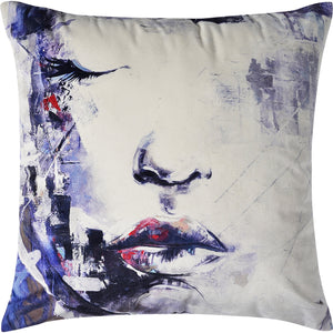 Annika Indoor Pillow featuring abstract face art in blue and red tones on a cream background