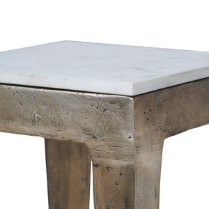 Abby Side Table close-up showing the marble top and bronze base