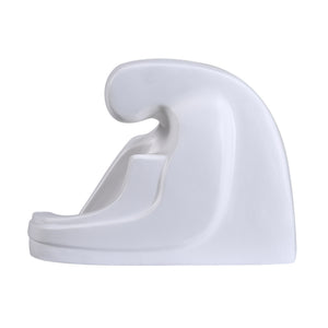 Imagine Statue by Renwil, side view of white abstract sculpture featuring flowing lines.